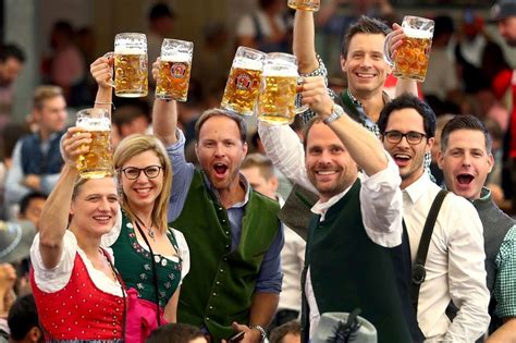 Beer flows and crowds descend on Munich for the official start of Oktoberfest